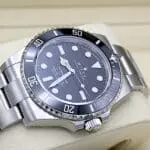 Rolex Submariner / Ref.: 124060 / 5-2022 / Stickers / B + P /